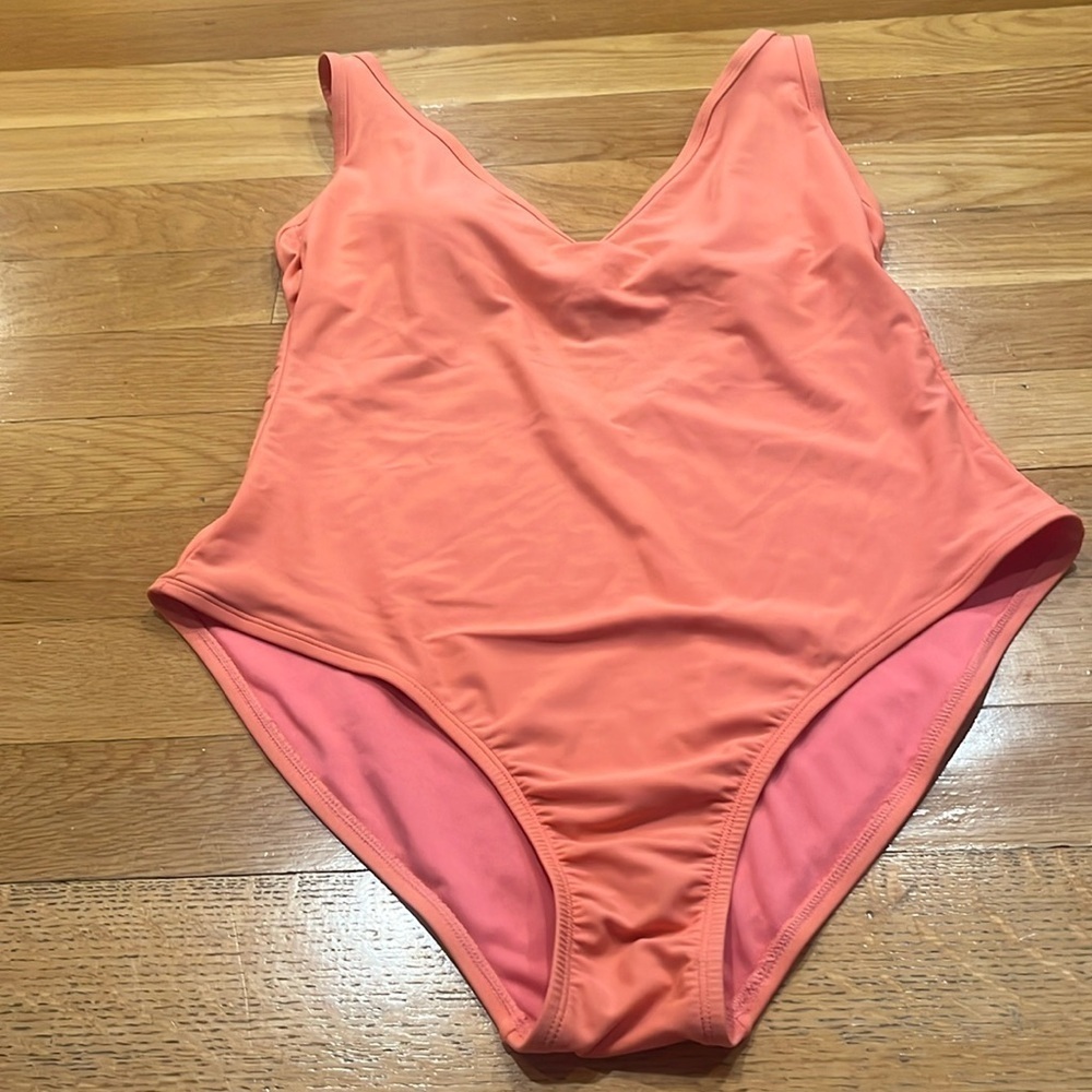 Kona sol women’s peach color vneck one piece swimsuit size xlarge.